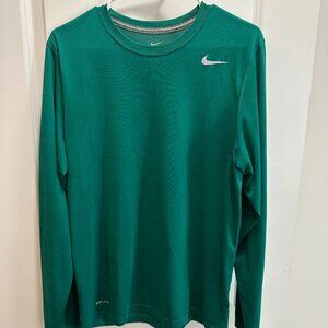 Green Nike Dri-FIT long-sleeve performance shirt.